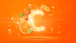 Gemüse mit Vitamin C - Leuchtendes Vitamin C Symbol mit Paprika, Brokkoli, Orange und Erdbeere